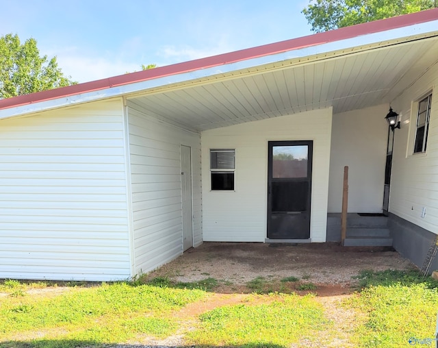 17441 E Limestone Rd, Athens, AL 35613 - view of exterior entry with a carport