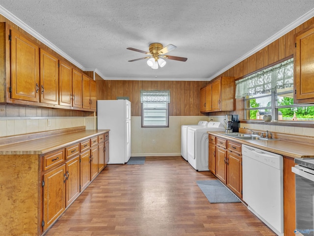 17441 E Limestone Rd, Athens, AL 35613 - kitchen with white appliances, a sink, washer and dryer, a ceiling fan, and light countertops