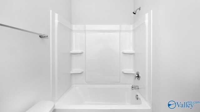 bathroom featuring bathing tub / shower combination