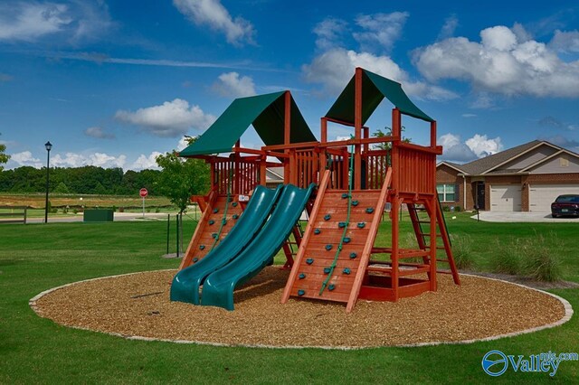 view of jungle gym with a yard