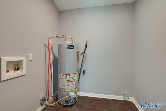 utility room featuring water heater