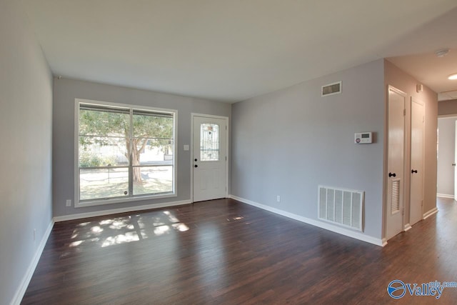 interior space with dark wood-type flooring