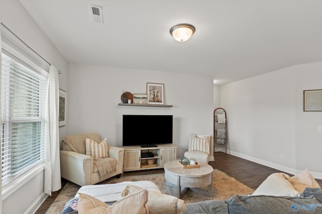 26674 Kyle Ln, Athens, AL 35613 - living room with wood finished floors, healthy amount of natural light, and baseboards
