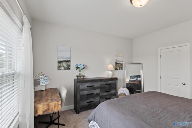 26674 Kyle Ln, Athens, AL 35613 - carpeted bedroom with baseboards and a desk