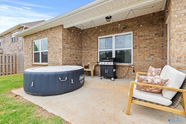 26674 Kyle Ln, Athens, AL 35613 - view of patio featuring fence, area for grilling, and a hot tub