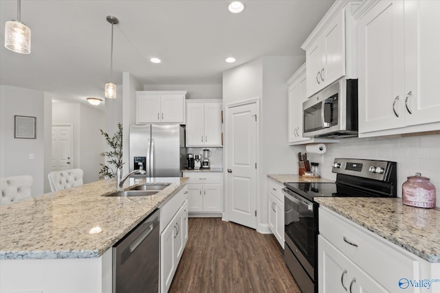 26674 Kyle Ln, Athens, AL 35613 - kitchen featuring stainless steel appliances, a sink, decorative backsplash, white cabinets, and dark wood-style floors
