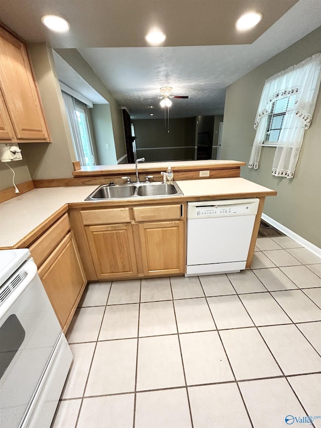 1313 Barry Rd, Anniston, AL 36206 - kitchen with a sink, range, light countertops, and white dishwasher