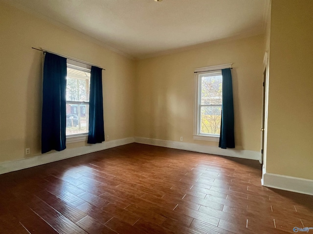 spare room featuring dark hardwood / wood-style floors