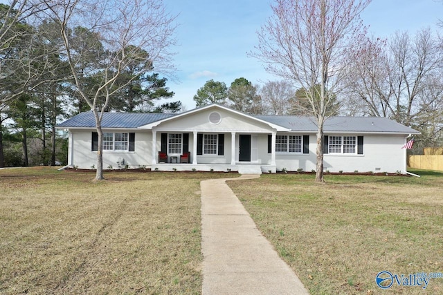 ranch-style house with covered porch and a front lawn