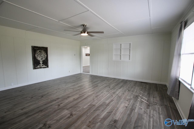 spare room featuring hardwood / wood-style flooring and ceiling fan