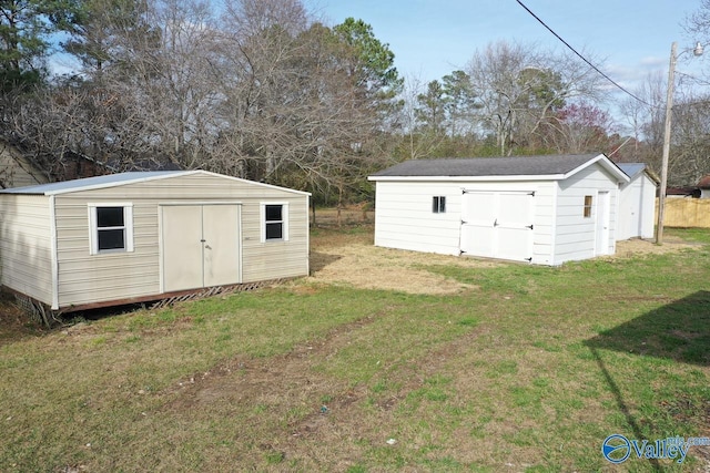 view of outdoor structure with a yard