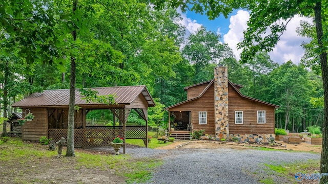 view of log-style house