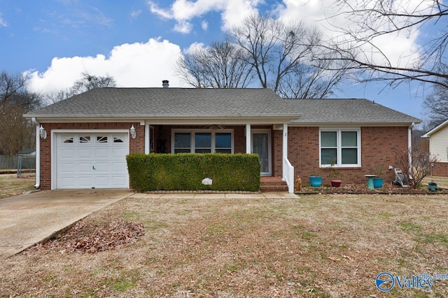 single story home featuring a garage and a front yard