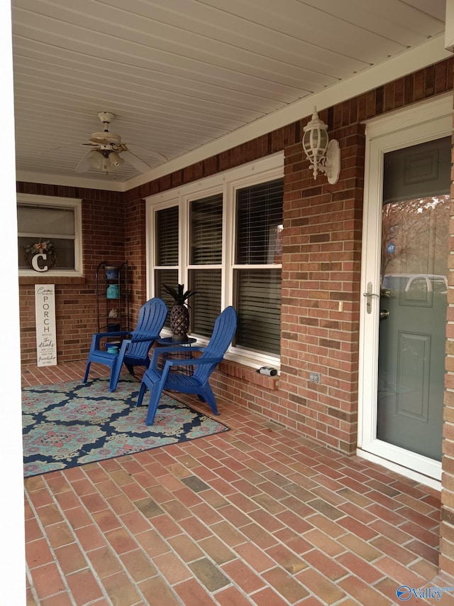 view of patio featuring covered porch and ceiling fan