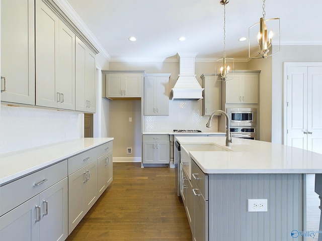 kitchen featuring dark hardwood / wood-style flooring, gray cabinets, and custom exhaust hood