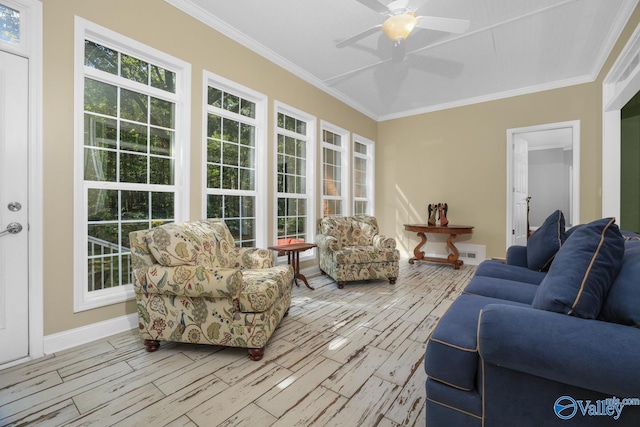 interior space featuring ceiling fan, crown molding, and light hardwood / wood-style floors