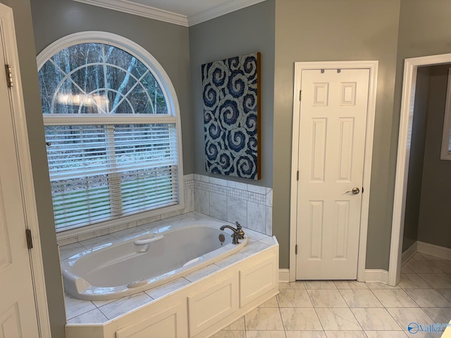 2961 Hobbs Island Rd SE, Huntsville, AL 35803 - bathroom featuring crown molding, baseboards, and a bath