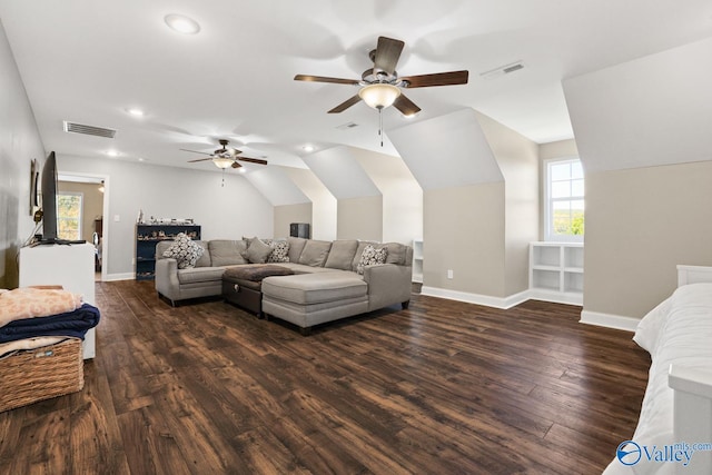 living room with ceiling fan, lofted ceiling, and dark hardwood / wood-style flooring