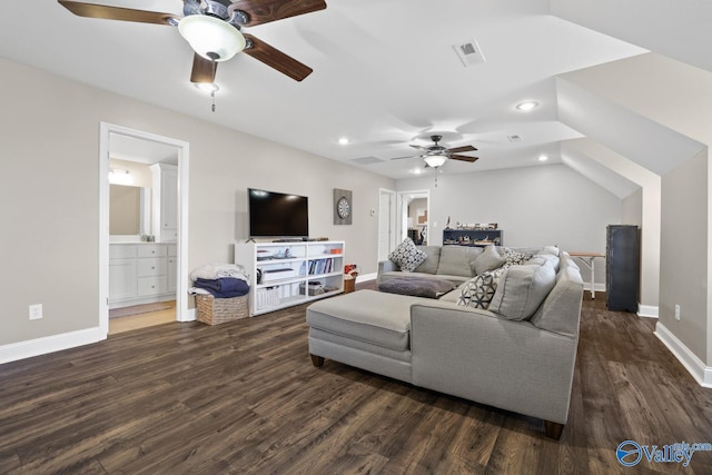 living room featuring dark hardwood / wood-style floors and ceiling fan