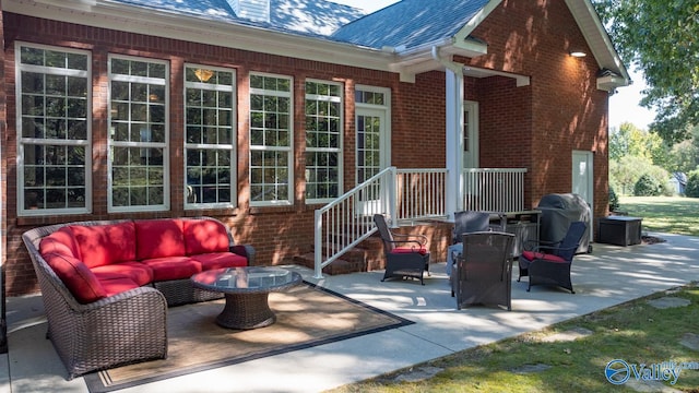 view of patio / terrace with a grill and outdoor lounge area