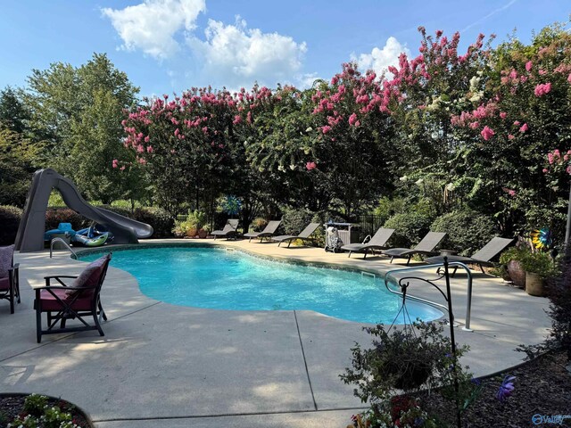 2961 Hobbs Island Rd SE, Huntsville, AL 35803 - pool with a water slide and a patio area