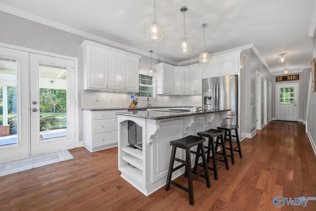 2961 Hobbs Island Rd SE, Huntsville, AL 35803 - kitchen with white cabinetry, open shelves, stainless steel fridge, and french doors