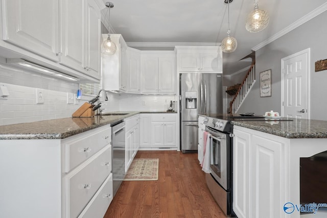 2961 Hobbs Island Rd SE, Huntsville, AL 35803 - kitchen featuring a sink, stainless steel appliances, dark wood-style flooring, and white cabinetry