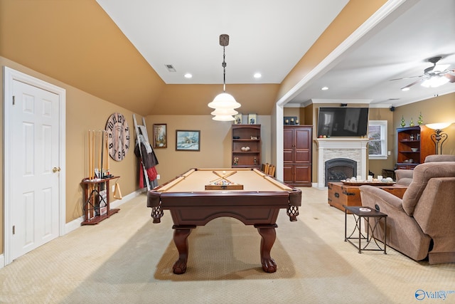 playroom with recessed lighting, visible vents, light carpet, a stone fireplace, and baseboards