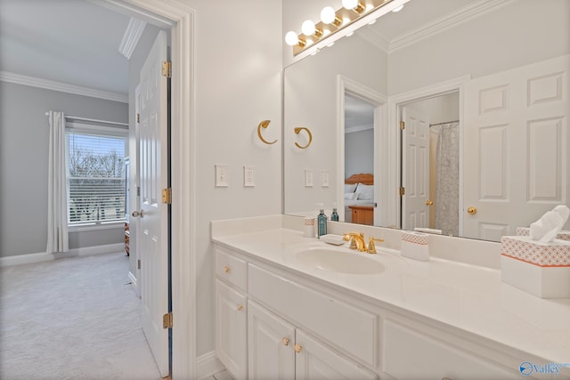 full bath with crown molding, vanity, and baseboards