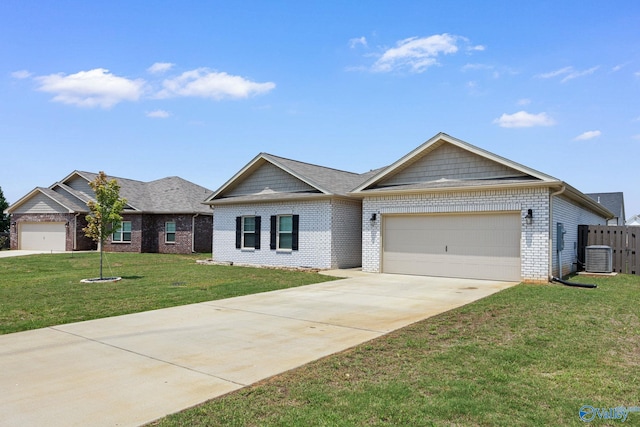 single story home with a front lawn, cooling unit, and a garage