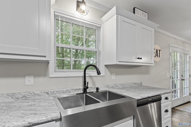 3559 County Road 1570, Baileyton, AL 35019 - kitchen with a sink, ornamental molding, stainless steel dishwasher, and white cabinetry