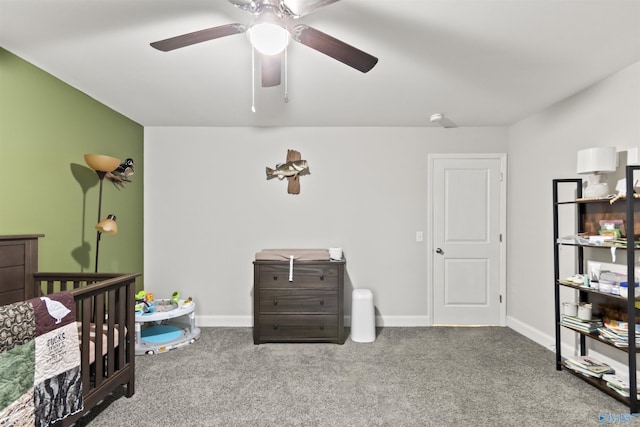 3559 County Road 1570, Baileyton, AL 35019 - carpeted bedroom featuring baseboards, a nursery area, and ceiling fan