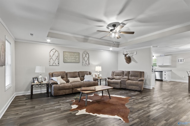 3559 County Road 1570, Baileyton, AL 35019 - living area with dark wood-style floors, ceiling fan, visible vents, and a raised ceiling