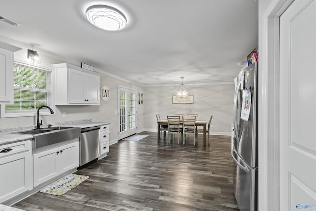 3559 County Road 1570, Baileyton, AL 35019 - kitchen with dark wood-style flooring, light countertops, visible vents, stainless steel appliances, and a sink