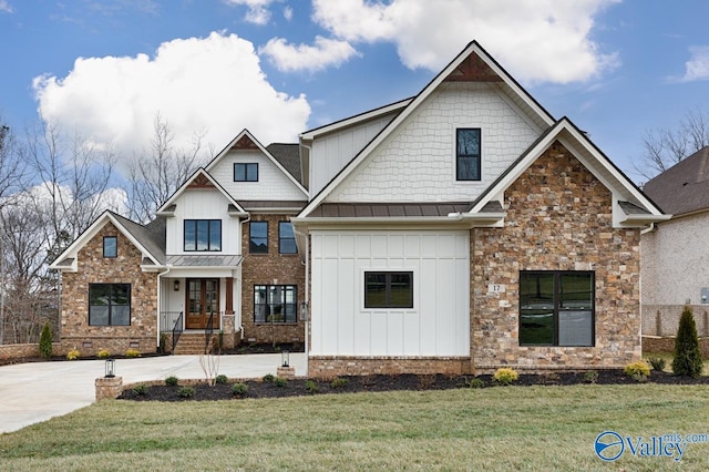 craftsman inspired home with a front lawn