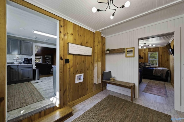 hallway with light wood-style floors