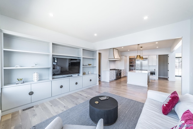 living room featuring hardwood / wood-style flooring