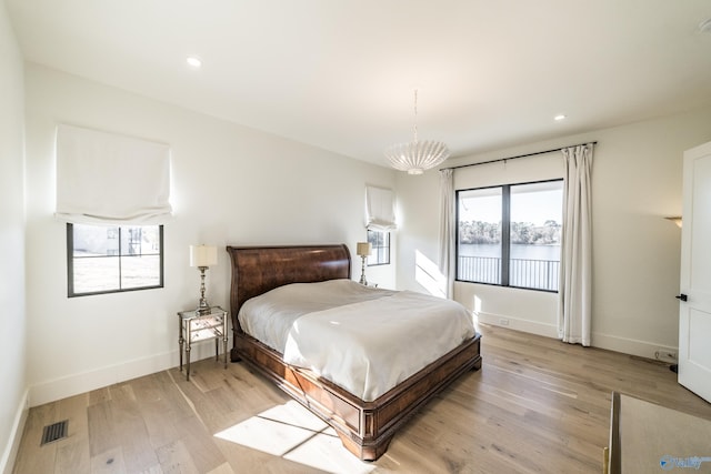 bedroom featuring light hardwood / wood-style flooring