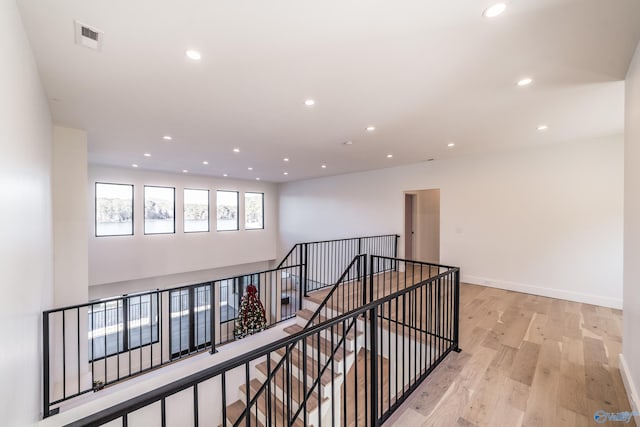 hall with light wood-type flooring