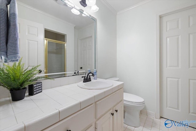 bathroom with vanity, tile patterned flooring, toilet, baseboards, and a shower stall