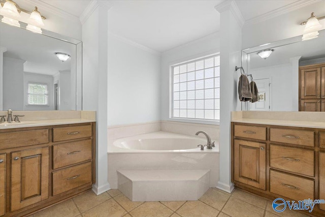 bathroom featuring vanity, tile patterned flooring, and a garden tub