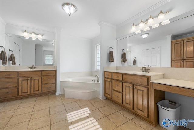 full bathroom featuring crown molding, two vanities, a sink, and a bath