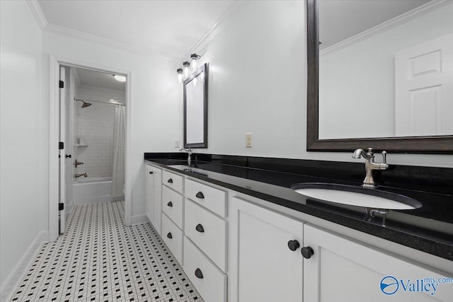 bathroom with a sink, double vanity, baseboards, shower / tub combo, and ornamental molding