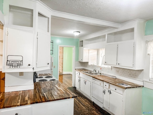 kitchen featuring sink, crown molding, white cabinetry, white dishwasher, and wood counters