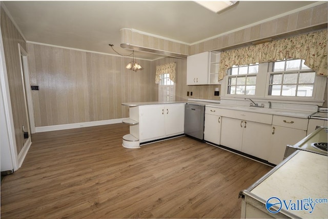 514 W St, Scottsboro, AL 35768 - kitchen with stainless steel dishwasher, light countertops, ornamental molding, and open shelves