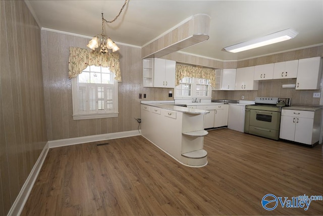 514 W St, Scottsboro, AL 35768 - kitchen with a notable chandelier, crown molding, open shelves, dark wood finished floors, and electric range