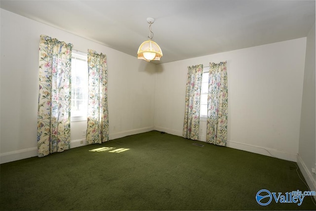 514 W St, Scottsboro, AL 35768 - carpeted empty room with baseboards