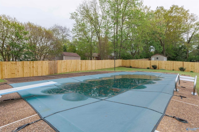 1903 Garner St, Scottsboro, AL 35769 - view of swimming pool with a fenced in pool, a patio, a fenced backyard, and a diving board