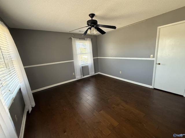 1903 Garner St, Scottsboro, AL 35769 - unfurnished room featuring ceiling fan, baseboards, a textured ceiling, and wood finished floors