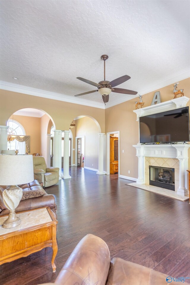 dining area featuring a tray ceiling, a wealth of natural light, crown molding, and a chandelier